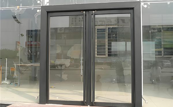 石泉玻璃地弹门